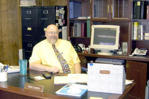 Former City Manager Dean Looper, behind his desk at City Hall, March 2023